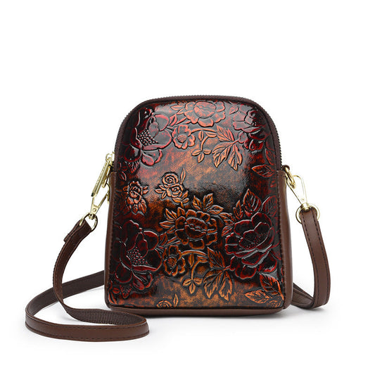 Bag for the shoulder with ethnic-style embossing