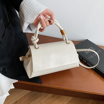 Women’s crossbody bag with mini top handle