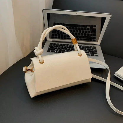 Women’s crossbody bag with mini top handle